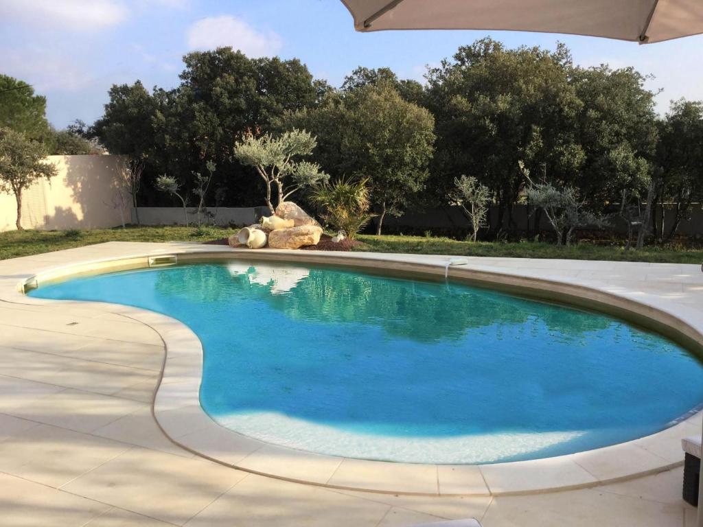 very pretty contemporary villa with heated pool located in aureille in the alpilles, close to the center on foot. sleeps 4. photo 3
