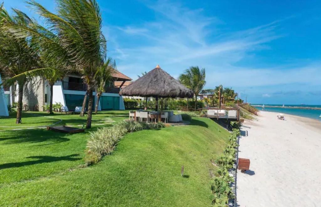 Flat beira mar no Manihi - Muro Alto photo 1