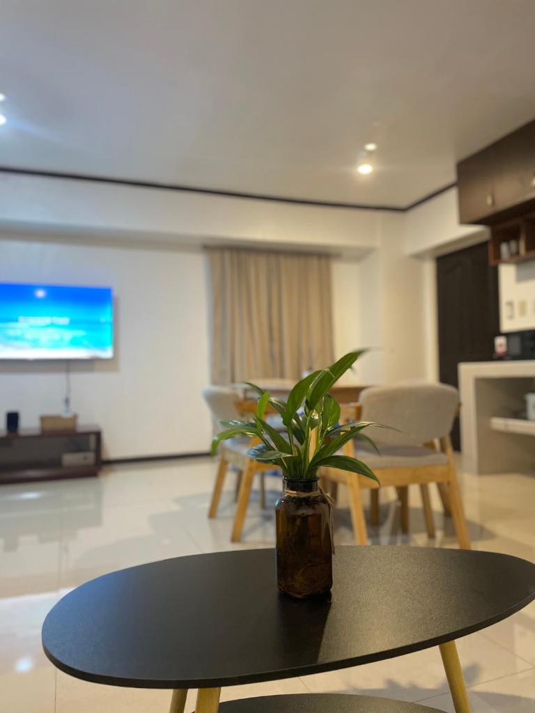 Affordable Tourist Studio Condo near Mactan Airport by A&C - Tap to explore photos