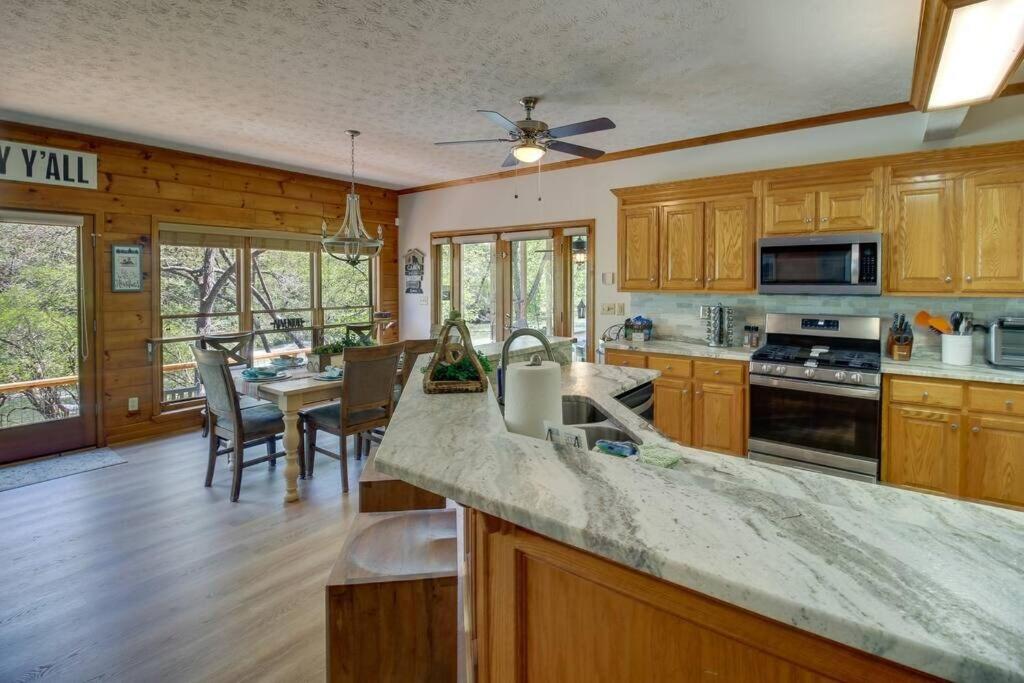 Riverfront Home w Gameroom & Screened Porch image
