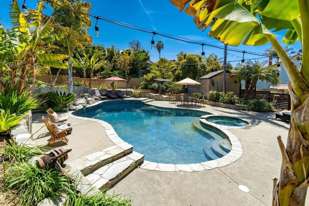 Resort style back yard heated pool and spa photo 4
