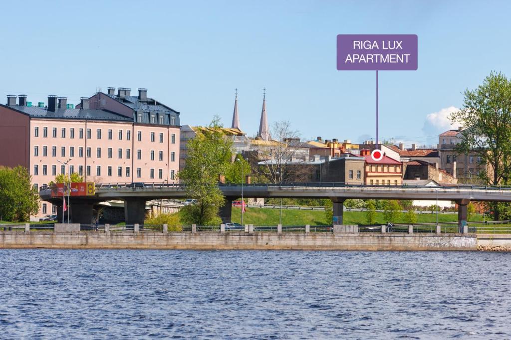 DaugavaLuxApartments Free Parking - Tap to explore photos