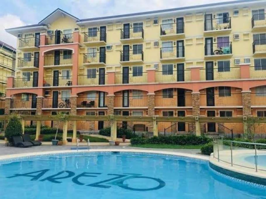 Cozy Condo with Swimming Pool, WIFI & Netflix good for 4PAX photo 1