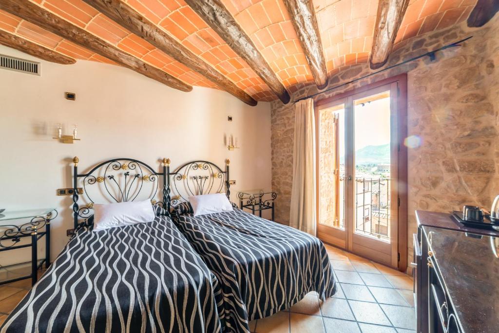 HOTEL EL CASTELL - Tap to explore photos