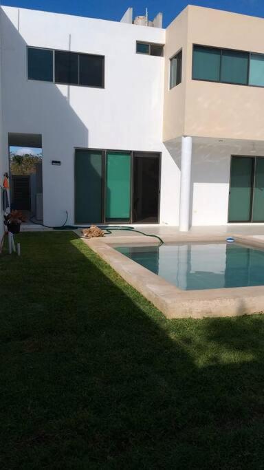 Residencia con ALBERCA y JARDÍN privado photo 4