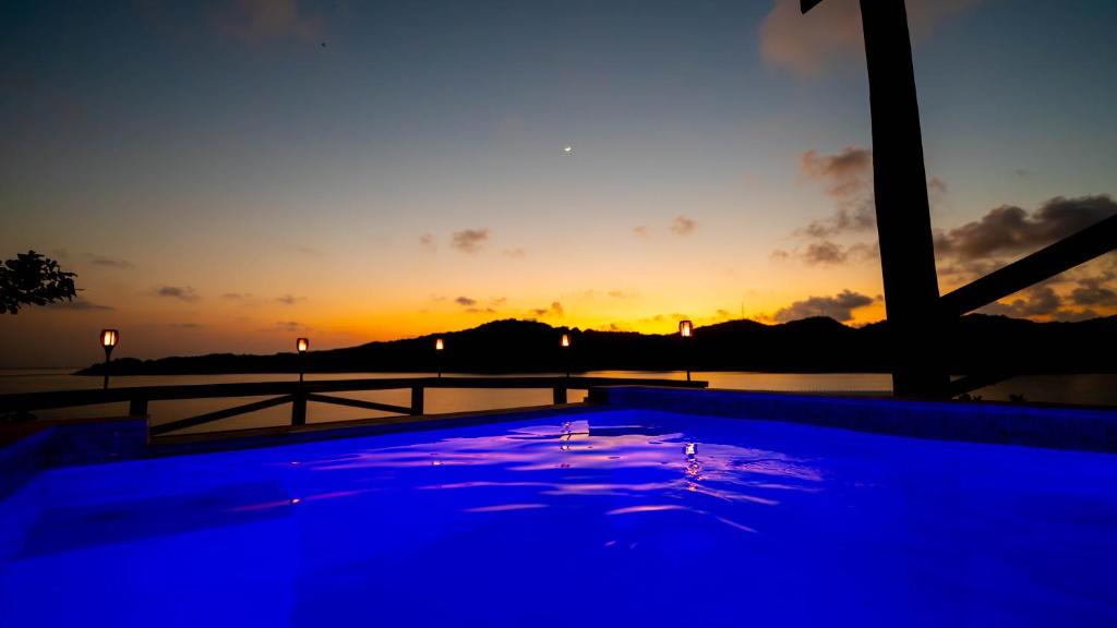 El Palacio Rosa on Blue Lagoon 2BR Beachfront Suite on pristine & quiet bay w incredible views photo 1