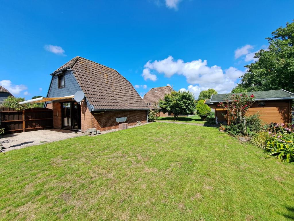 Mooi 4p huis met grote tuin vlakbij Strand&Meer!