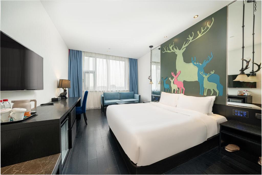 Orange Hotel Select Jiangqiao Cao'an Road Branch - Free Hongqiao Airport & Hongqiao Train station Shuttle Bus photo 1