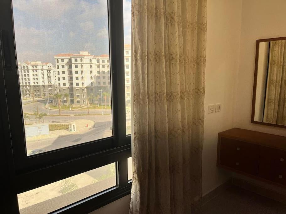 Stylish 2-Bedroom Retreat in New Capital City-Your Oasis at Celia Compound photo 4