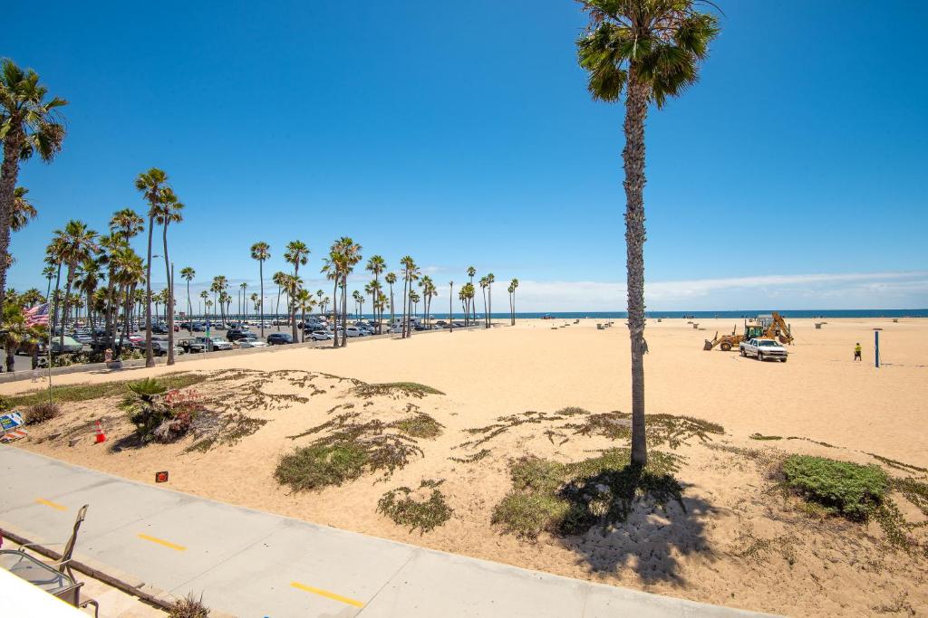 Multi Level Oceanfront Home with Patio on the Beach, Fire pit and 2 car garage - Tap to explore photos
