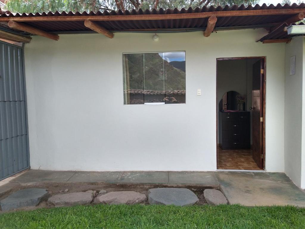 Casa con jardín y vista a las montañas Pisac photo 1