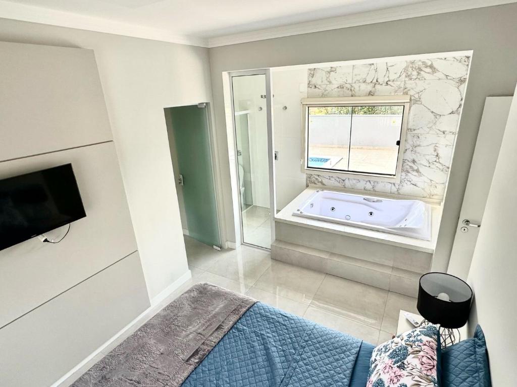 Casa luxuosa com piscina e hidromassagem! photo 3