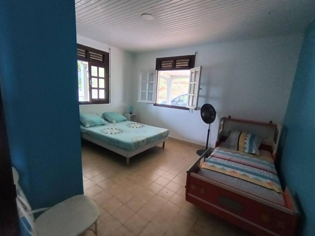 Maison de 4 chambres avec jacuzzi terrasse et wifi a Riviere Pilote a 3 km de la plage photo 3