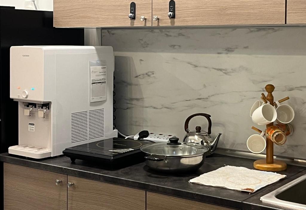 Family friendly 3 bedroom 8-10pax @Urban Suites photo 2