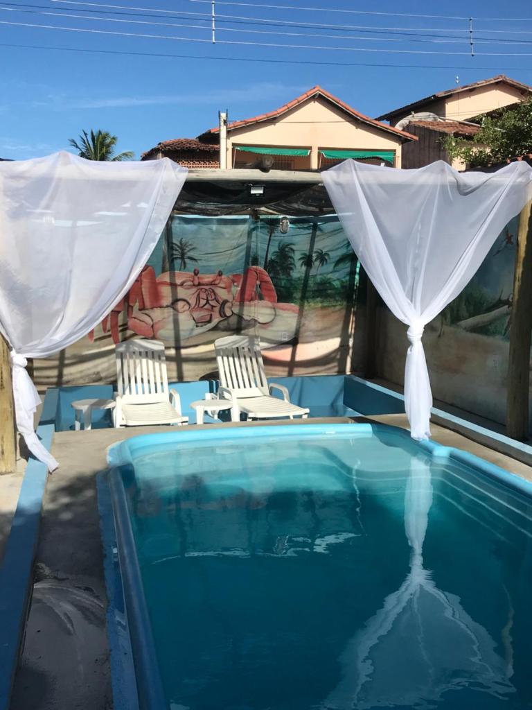 Casa Temporada Frente à Praia Piscina Ar cond Nova Viçosa VA photo 1