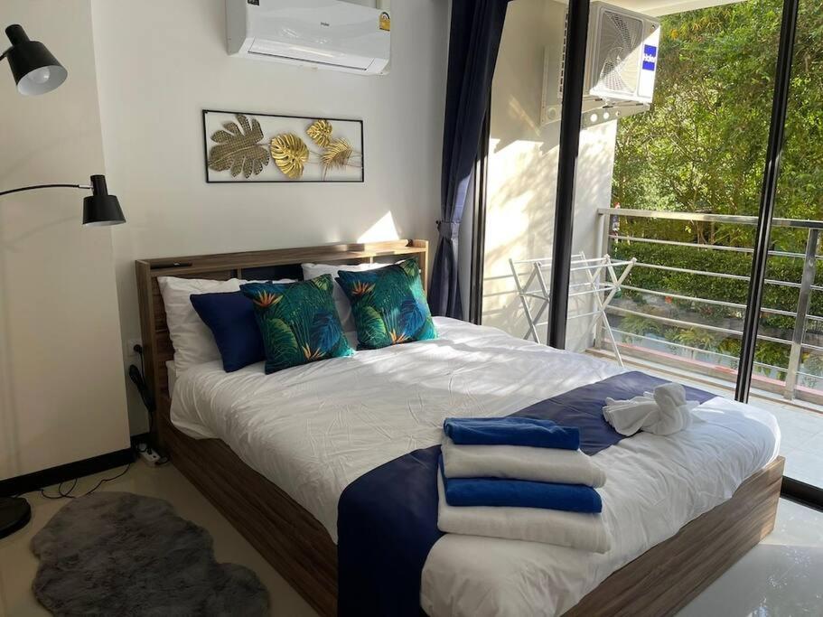 Новые апартаменты рядом с морем- 202 Rawai Beach Condo