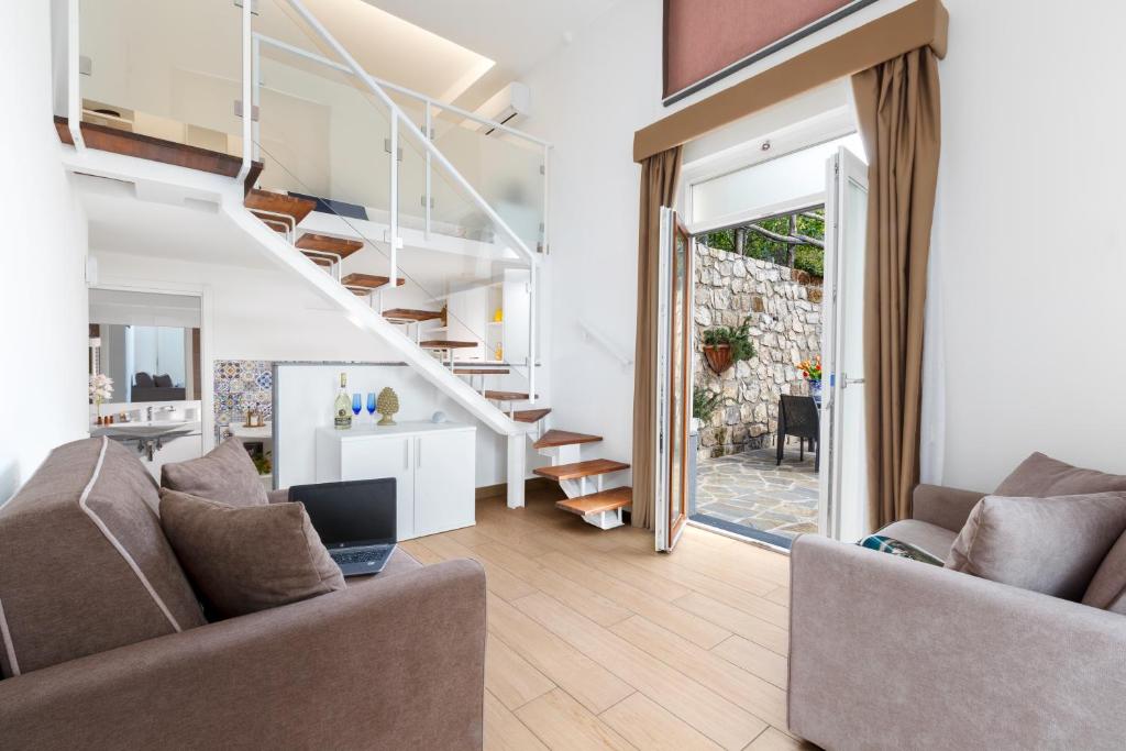 Eterea Charming Suites - Tap to explore photos