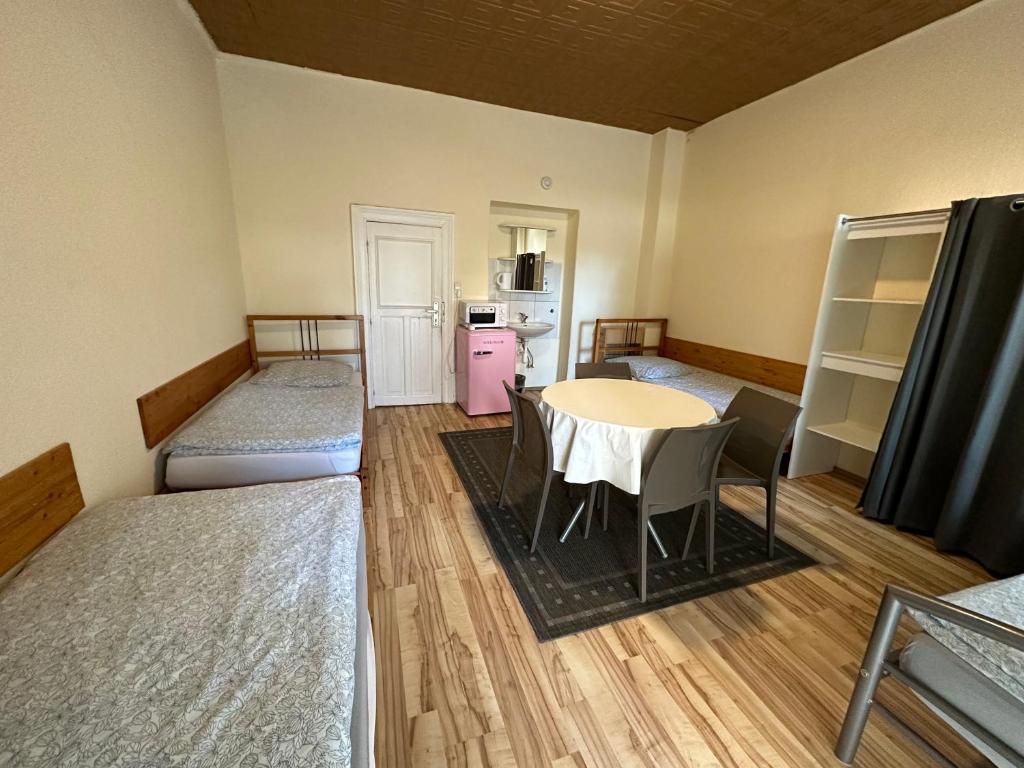 Bigus Room Type - Economy Quadruple Room with Shared Bathroom