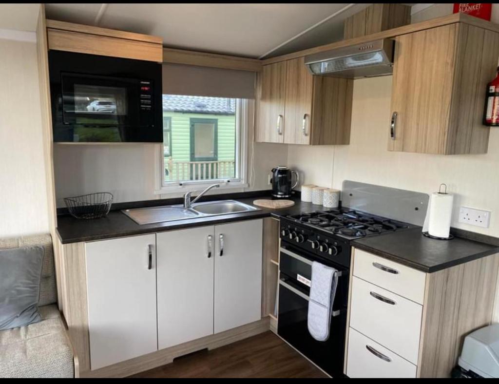 Experience Coastal Bliss in Our Fresh 2019 Sea Viev 2 Bedroom static caravan at Clarach Bay Holiday Village! photo 4
