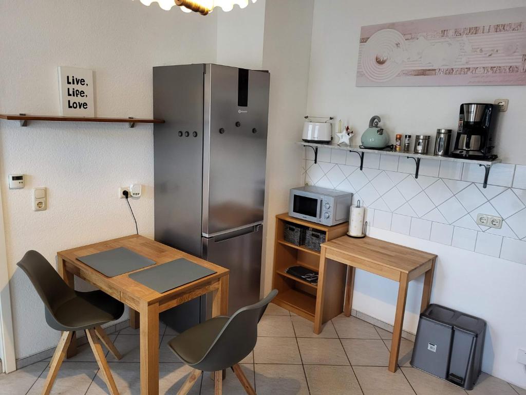 Einzelwohnung im EG mit Terrasse und AC photo 1