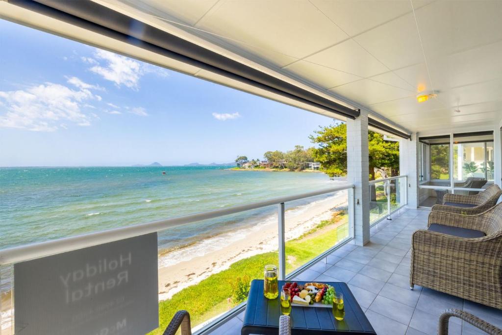 Sunrise Waters 2-63 Soldiers Point Road, stunning waterfront property photo 1