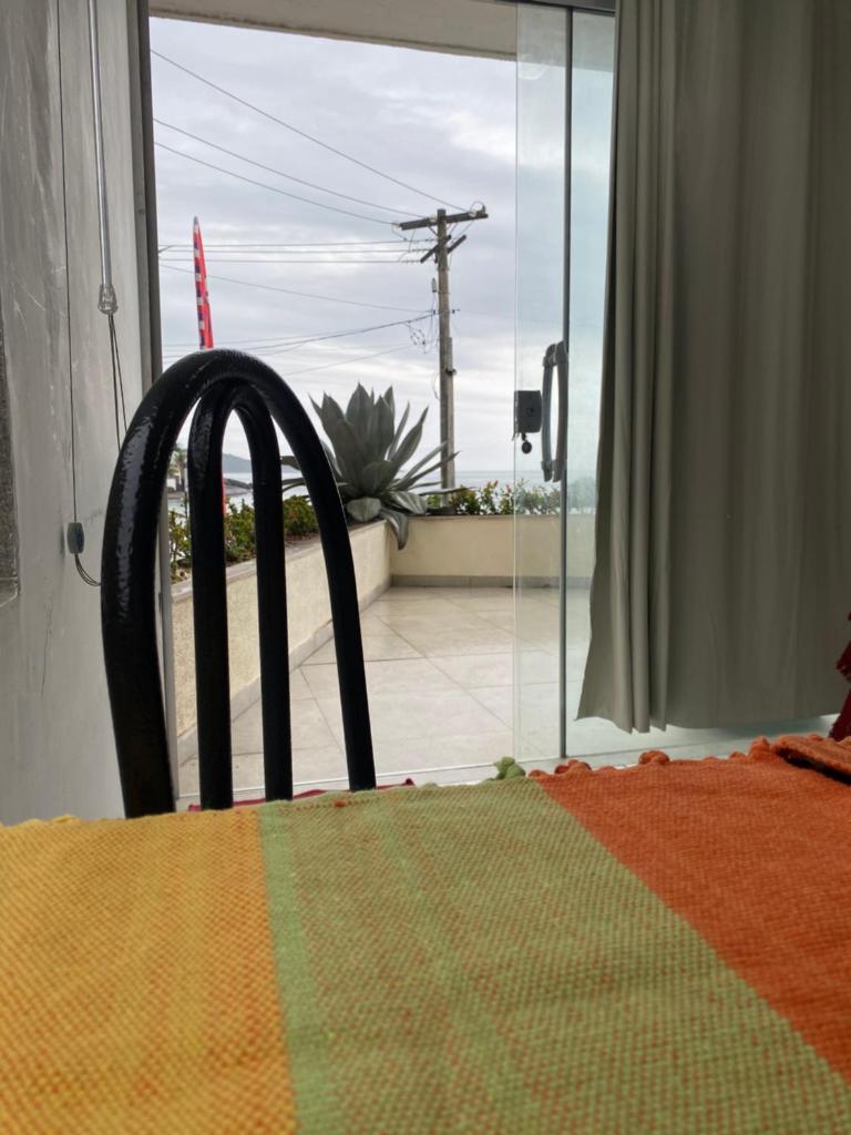Quarto e sala pé na areia photo 3