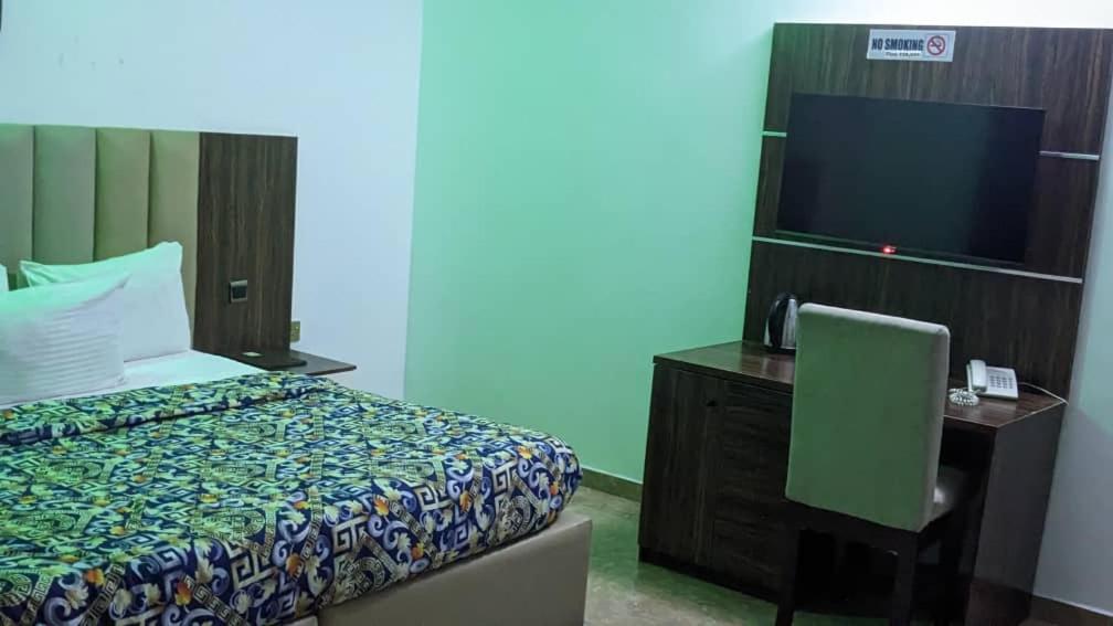 Kosam Global Hotel and Suites photo 3