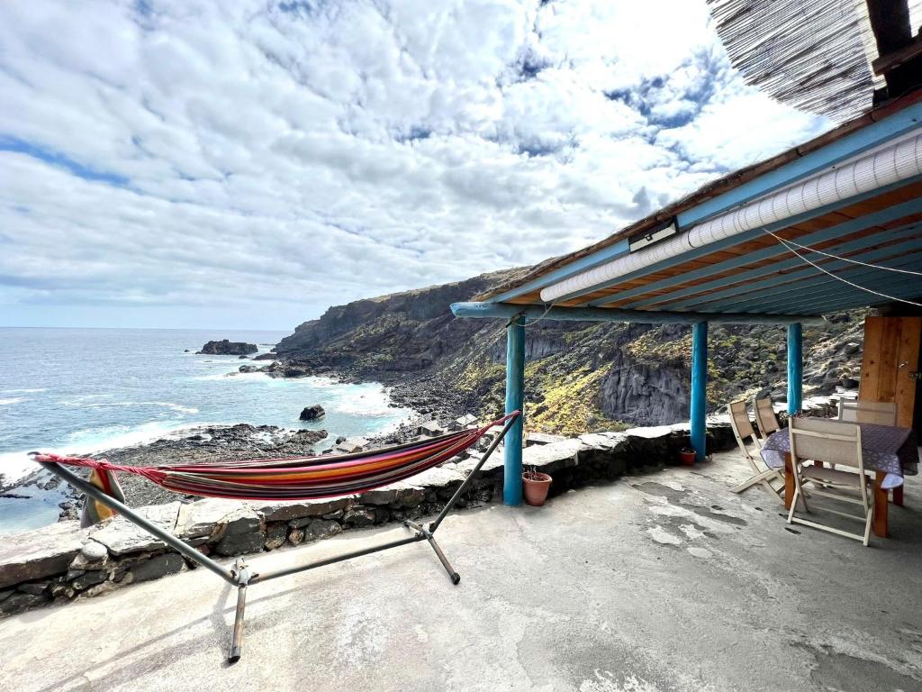 Casa Cueva en primera linea de mar, con barbacoa