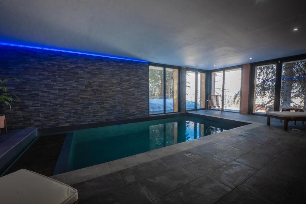Chalet du Bois Melay 5 étoiles - La Plagne 1800 - piscine - proche pistes - 15 personnes photo 2
