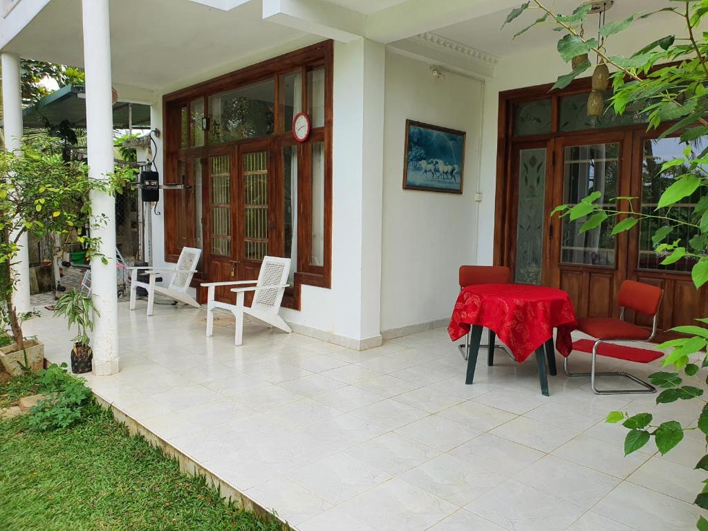 "GreenHeart" Eco - Family Room ' Groundfloor- outdoor Veranda Dining area ' Experience Tranquility of Nature photo 4
