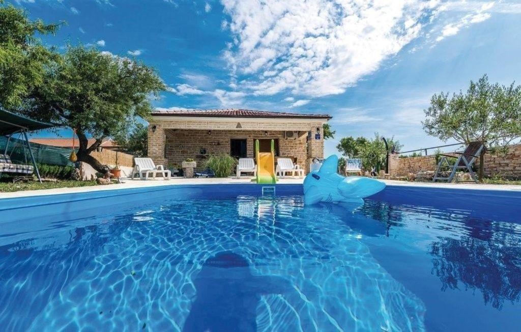Ferienhaus mit Privatpool für 7 Personen und 1 Kind in Budak, Dalmatien