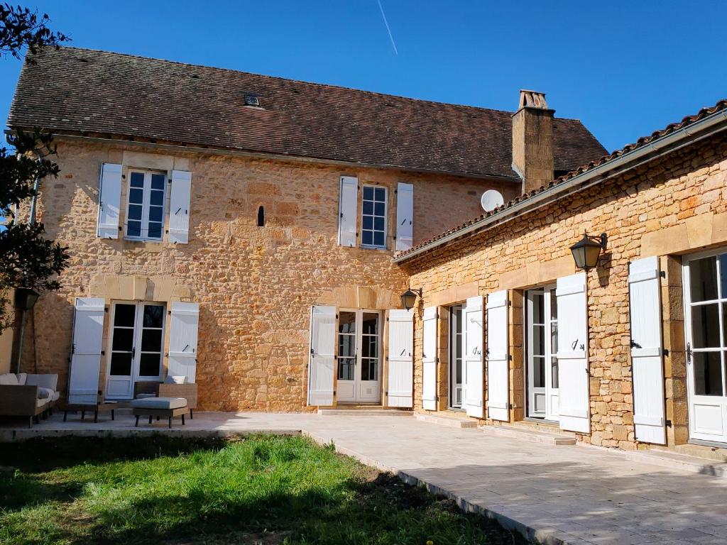 Maison en pierre avec piscine