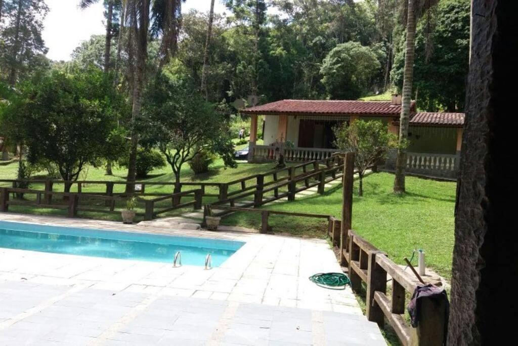 Casa de campo agradável com piscina, parquinho, lago, riacho, quadra, sinuca e mais! photo 2