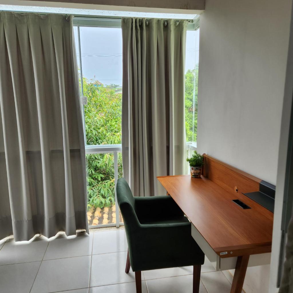 Casa confortável pertinho da praia com garagem e quintal photo 2