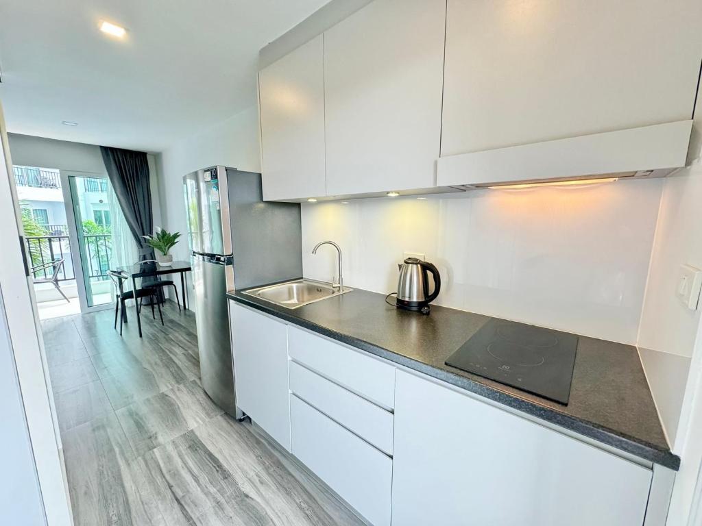 Mantra Beach Condominium Suite - Mae Phim Room Type - Apartment with Pool View 
