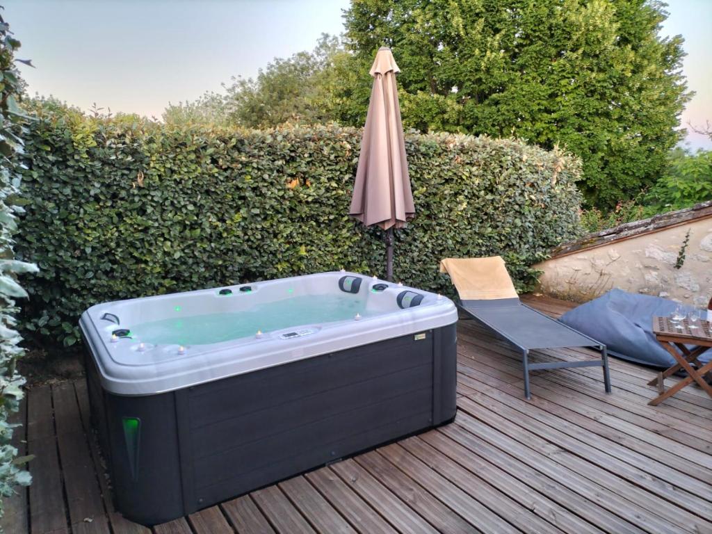 Le SPA d'Adélaïde son jacuzzi privé photo 1