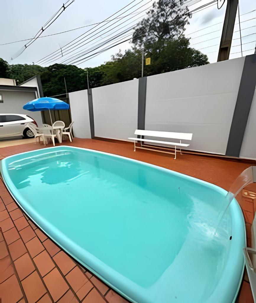 Casa próx. ao centro com 3 suítes e piscina photo 4