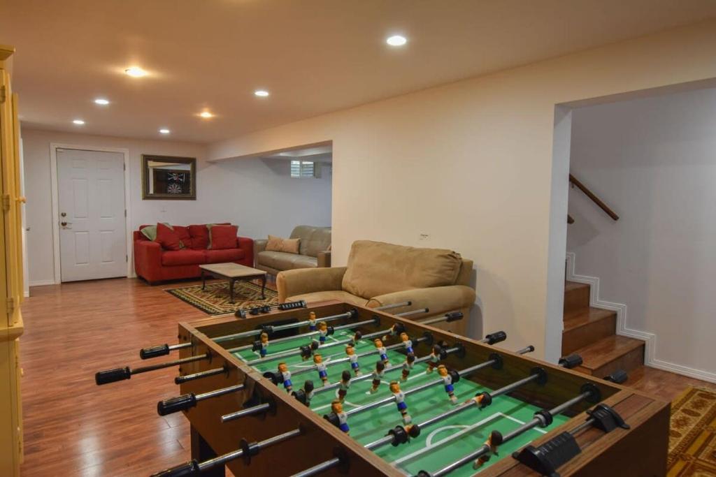 Screened in porch and fantastic game room photo 2