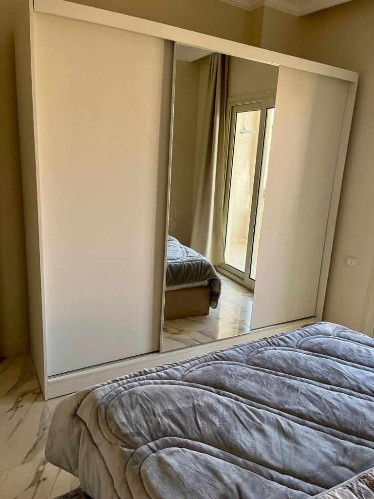 Family Apartment Near AUC - Tap to explore photos
