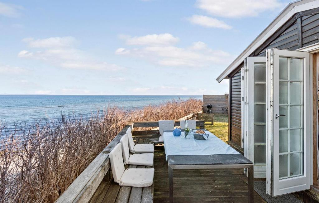 Beautiful Home In Dronningmlle With House Sea View photo 1