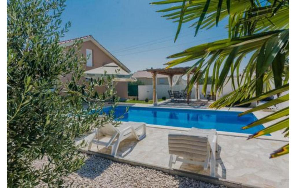 Holiday House Mell with pool photo 1