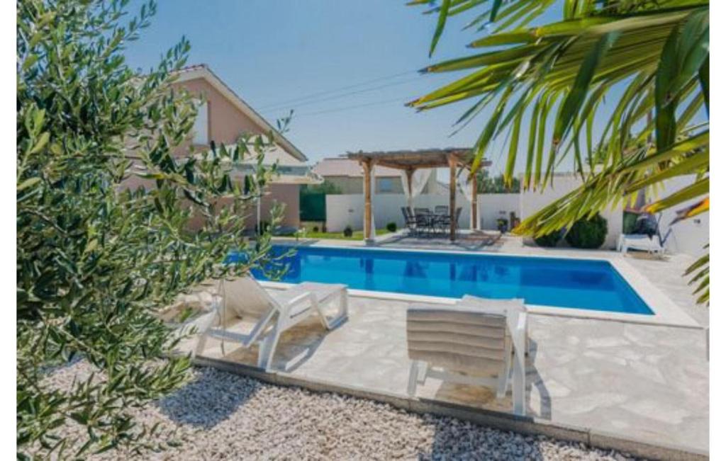 Holiday House Mell with pool photo 3