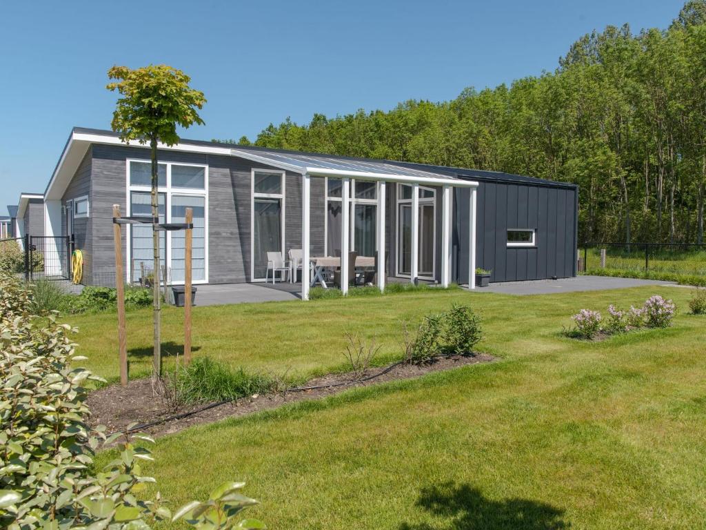 Holiday home on the edge of the forest in Zeeland photo 1