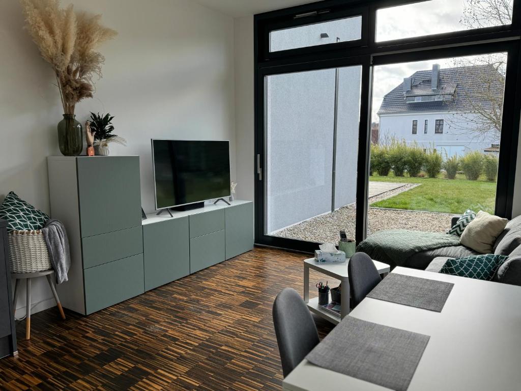 helle Ferienwohnung in Architektenhaus mit Garten und Pool photo 4