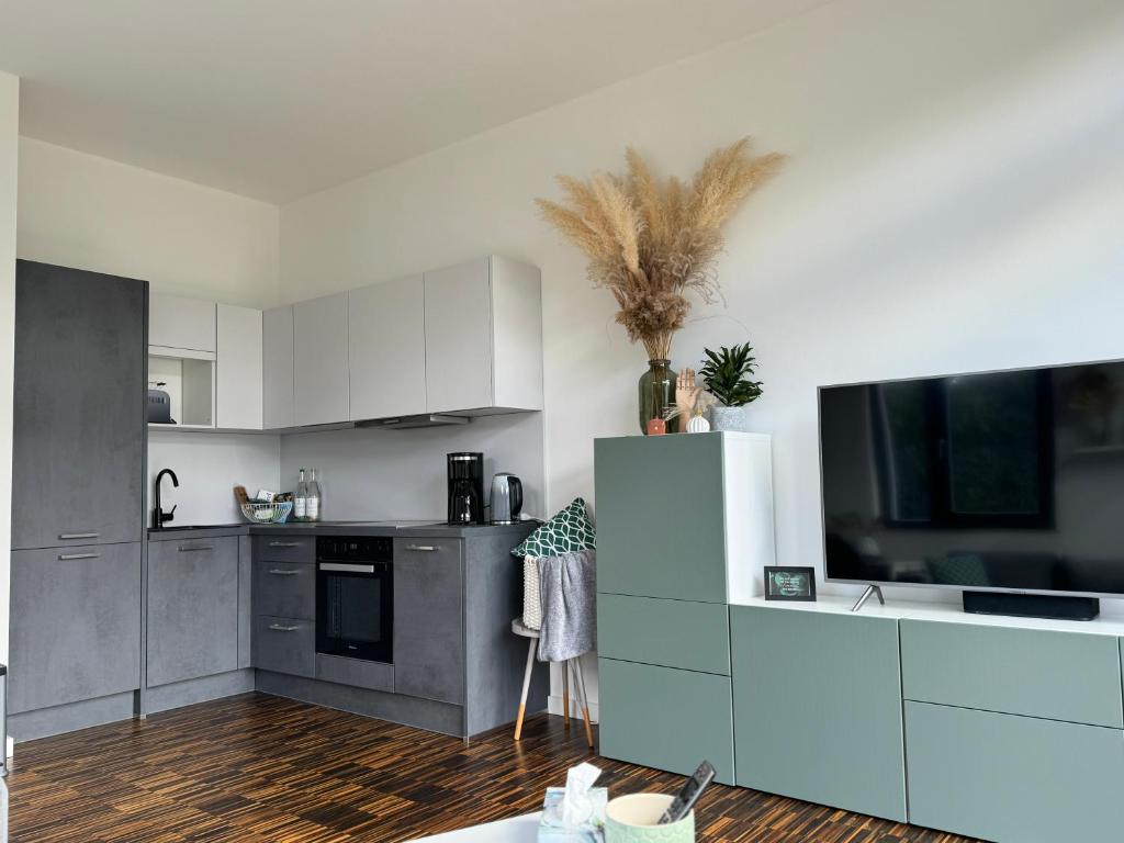 helle Ferienwohnung in Architektenhaus mit Garten und Pool photo 3