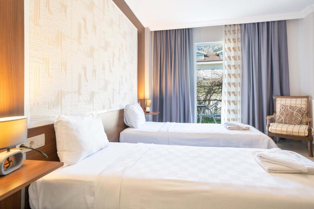 Dedeminn Garden Hotel - Tap to explore photos