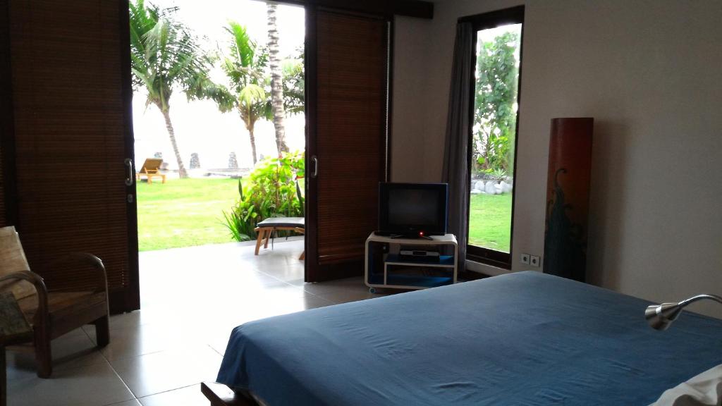 Amarta Beach Cottages - Tap to explore photos