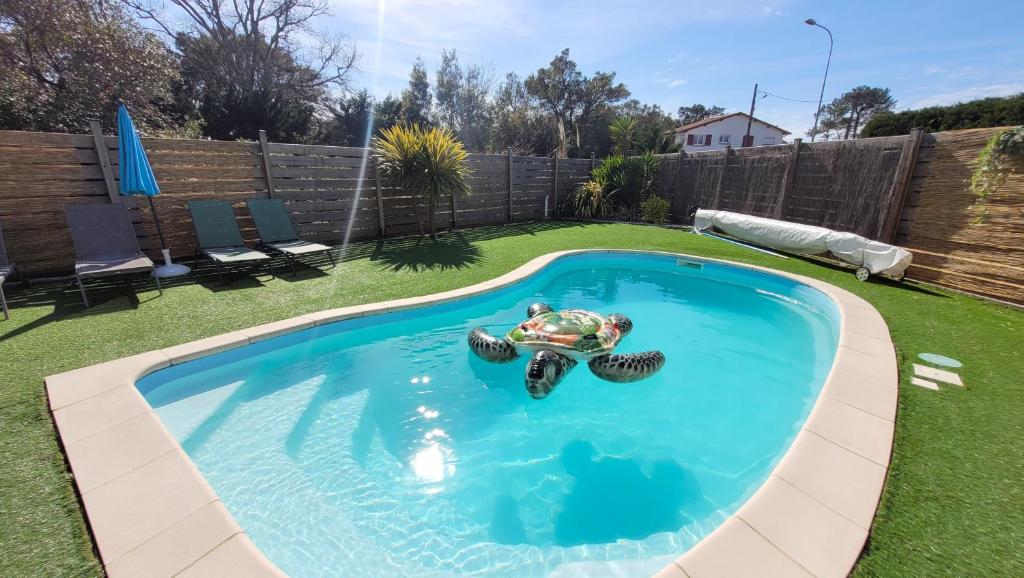 VILLA CASA KOKO 10 PERS piscine chauffée, pétanque, ping pong VIEUX-BOUCAU photo 1