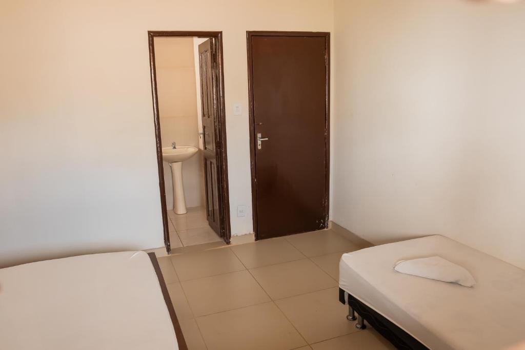 Quartos no centro de Três Marias photo 3