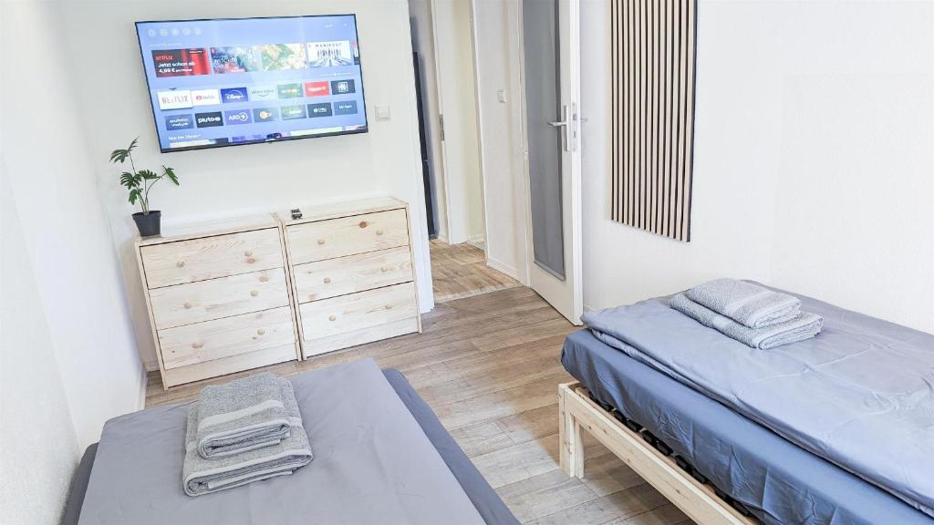 ALFA-Ludwigsburg-City-3-Zimmer-5-Betten-Kueche-Netflix-INET-WM photo 4
